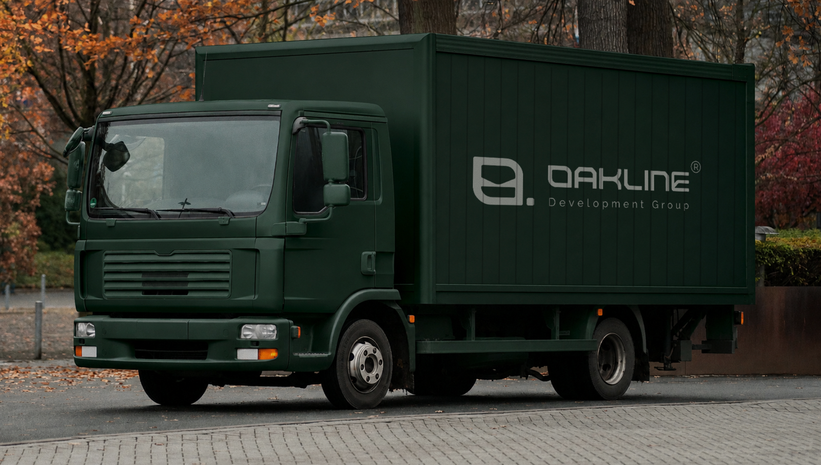 Oakline Development Group fleet truck livery in deep forest green