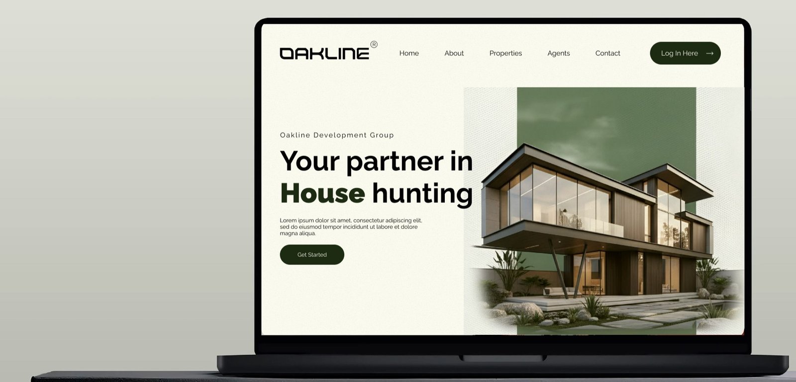 The Oakline Development Group website homepage shown on a laptop