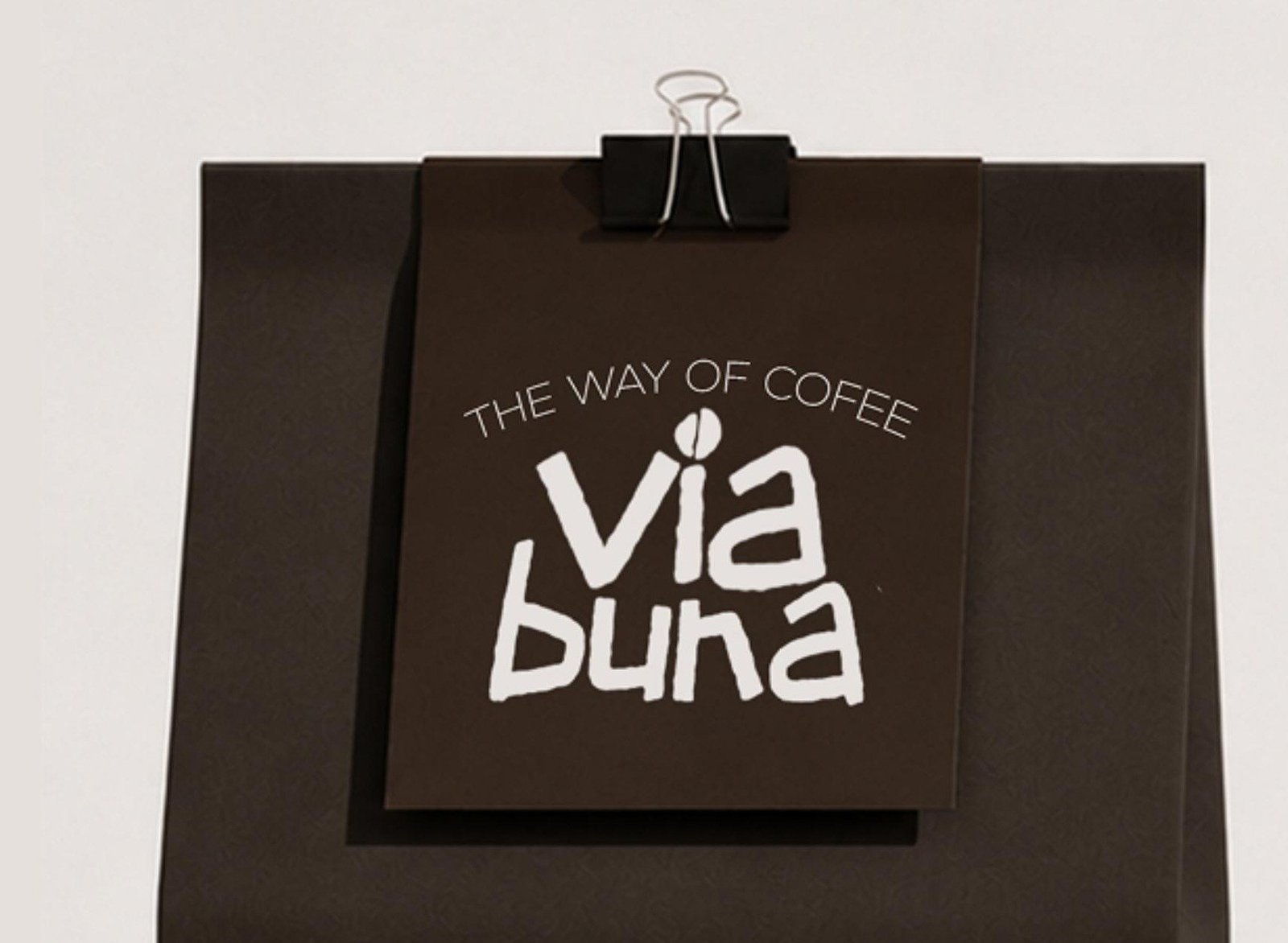 Via Buna kraft paper retail bag with a hand-tied brand hang tag